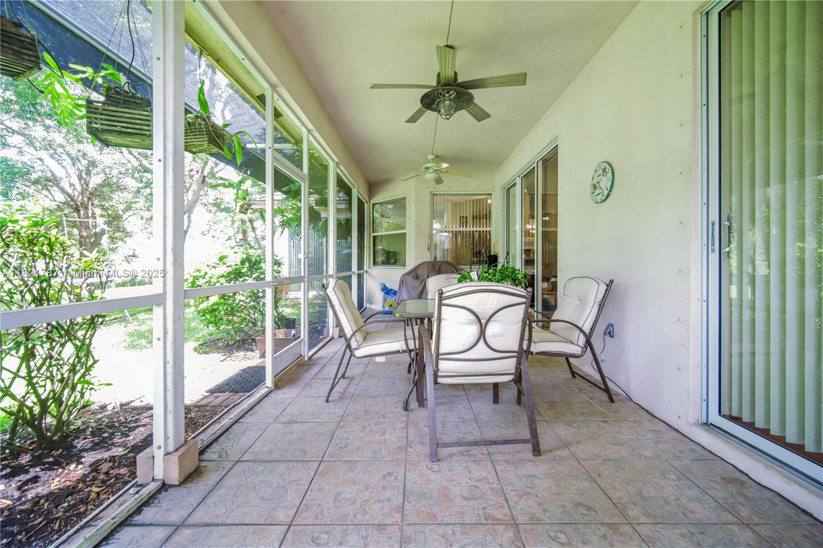 12620 Countryside Terrace Cooper City, FL 33330 - Photo 31 of 40 a view of a porch with chairs and backyard