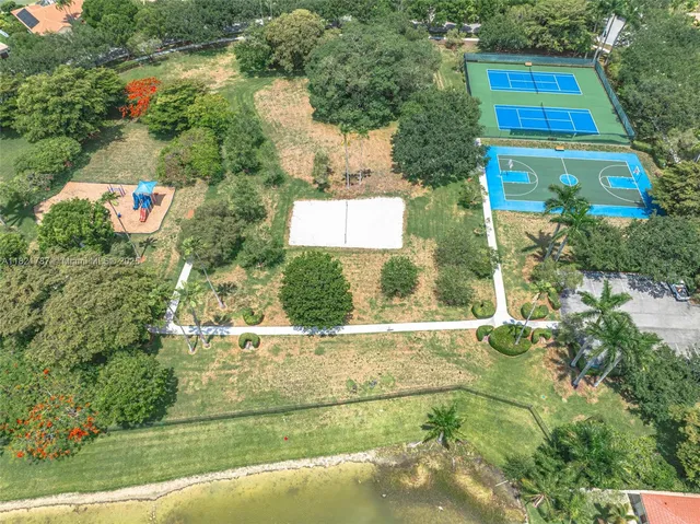 an aerial view of house with yard