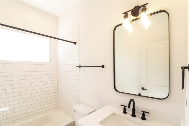 a front view of a house with street