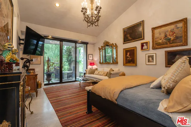 a bathroom with a tub and shower