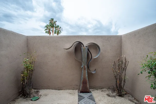 a outdoor dining space with furniture and outdoor view