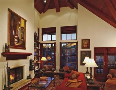 63 Willow Place, Unit 2 Vail, CO 81657 - Photo 3 of 8 a living room with furniture and a fireplace