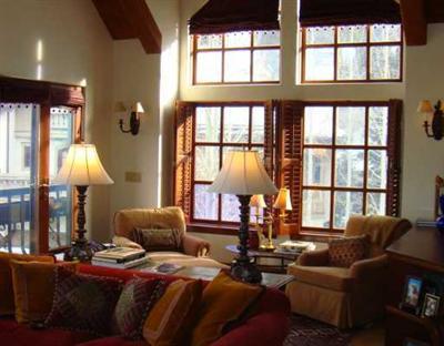 63 Willow Place, Unit 2 Vail, CO 81657 - Photo 4 of 8 a living room with furniture and a large window