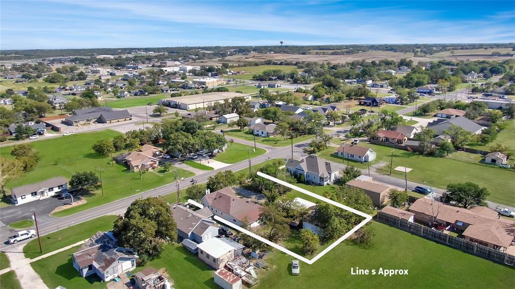 305 West Main Street Gunter, TX 75058 - Photo 5 of 8 an aerial view of residential houses with outdoor space