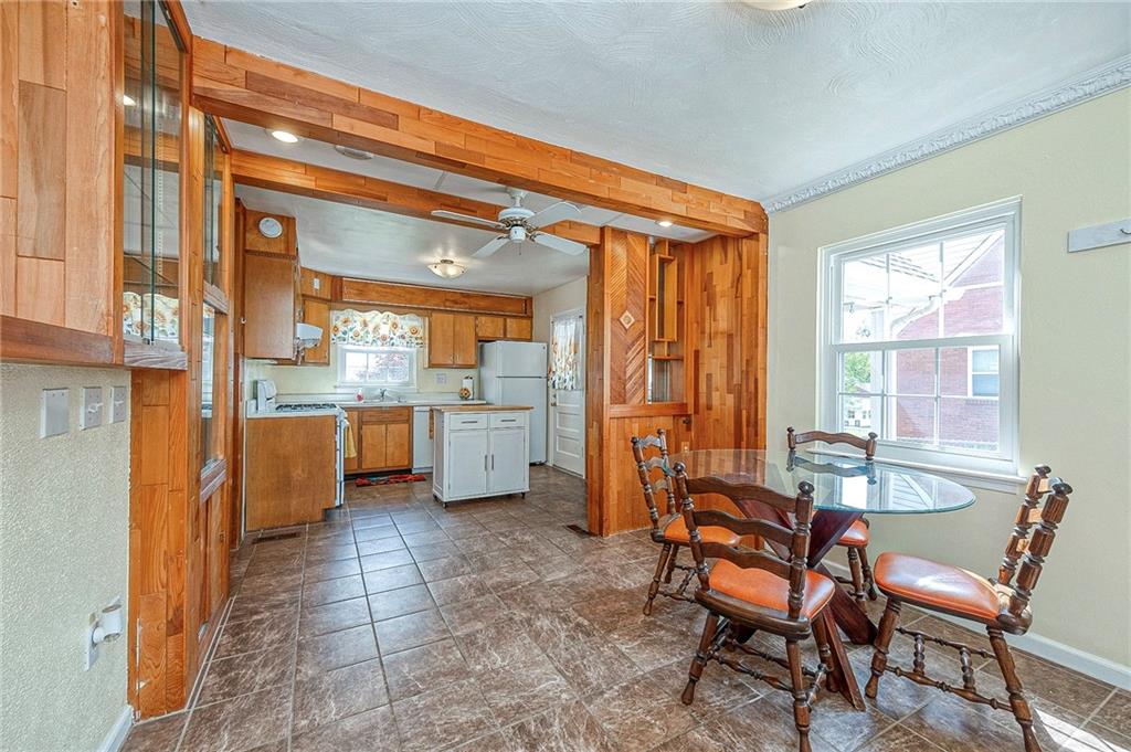 1816 Cardinal Avenue Aliquippa, PA 15001 - Photo 2 of 30 a view of a kitchen and dining room