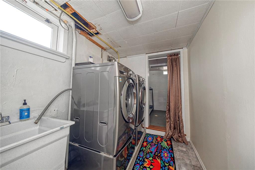 1816 Cardinal Avenue Aliquippa, PA 15001 - Photo 24 of 30 a utility room with dryer and washer