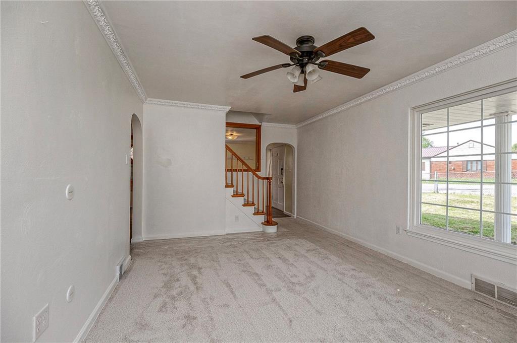 1816 Cardinal Avenue Aliquippa, PA 15001 - Photo 9 of 30 a view of room with ceiling fan and window