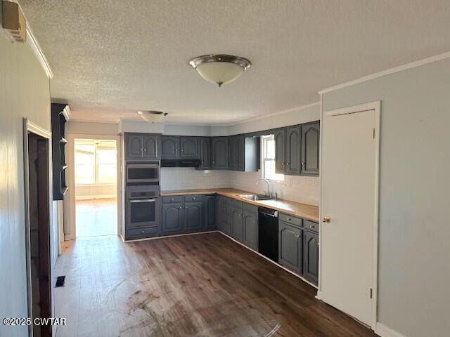617 King Street Ridgely, TN 38080 - Photo 11 of 23 a kitchen with stainless steel appliances granite countertop a refrigerator and a sink