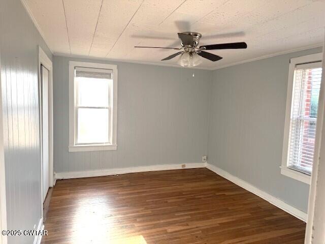 617 King Street Ridgely, TN 38080 - Photo 21 of 23 an empty room with wooden floor fan and windows
