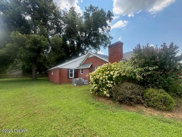 a house view with a garden space