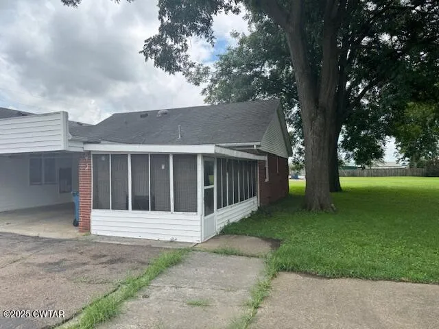 a house with garden in front of it