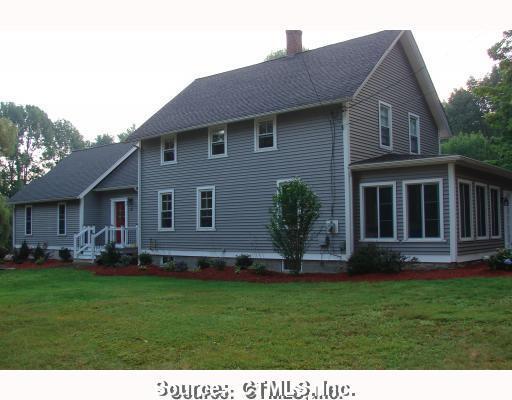 234 Green Hollow Road Killingly, CT 06239 - Photo 1 of 1 a backyard of a house with lots of green space