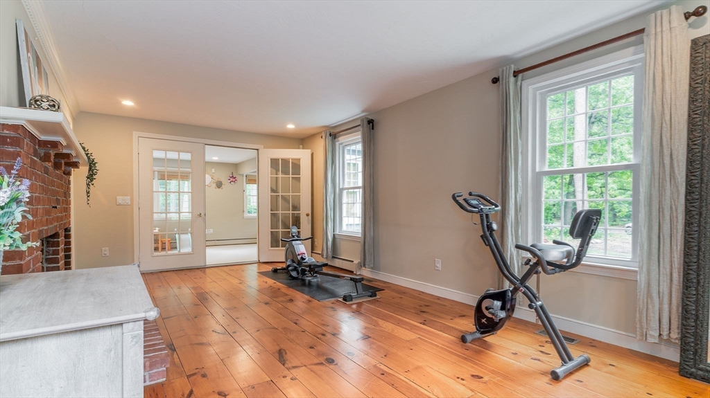 142 Baker Street Walpole, MA 02081 - Photo 21 of 42 a view of a room with gym equipment