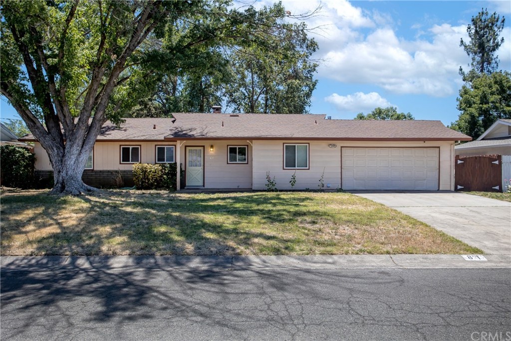 81 Ceres Circle Chico, CA 95926 - Photo 1 of 1 a front view of a house with a garden