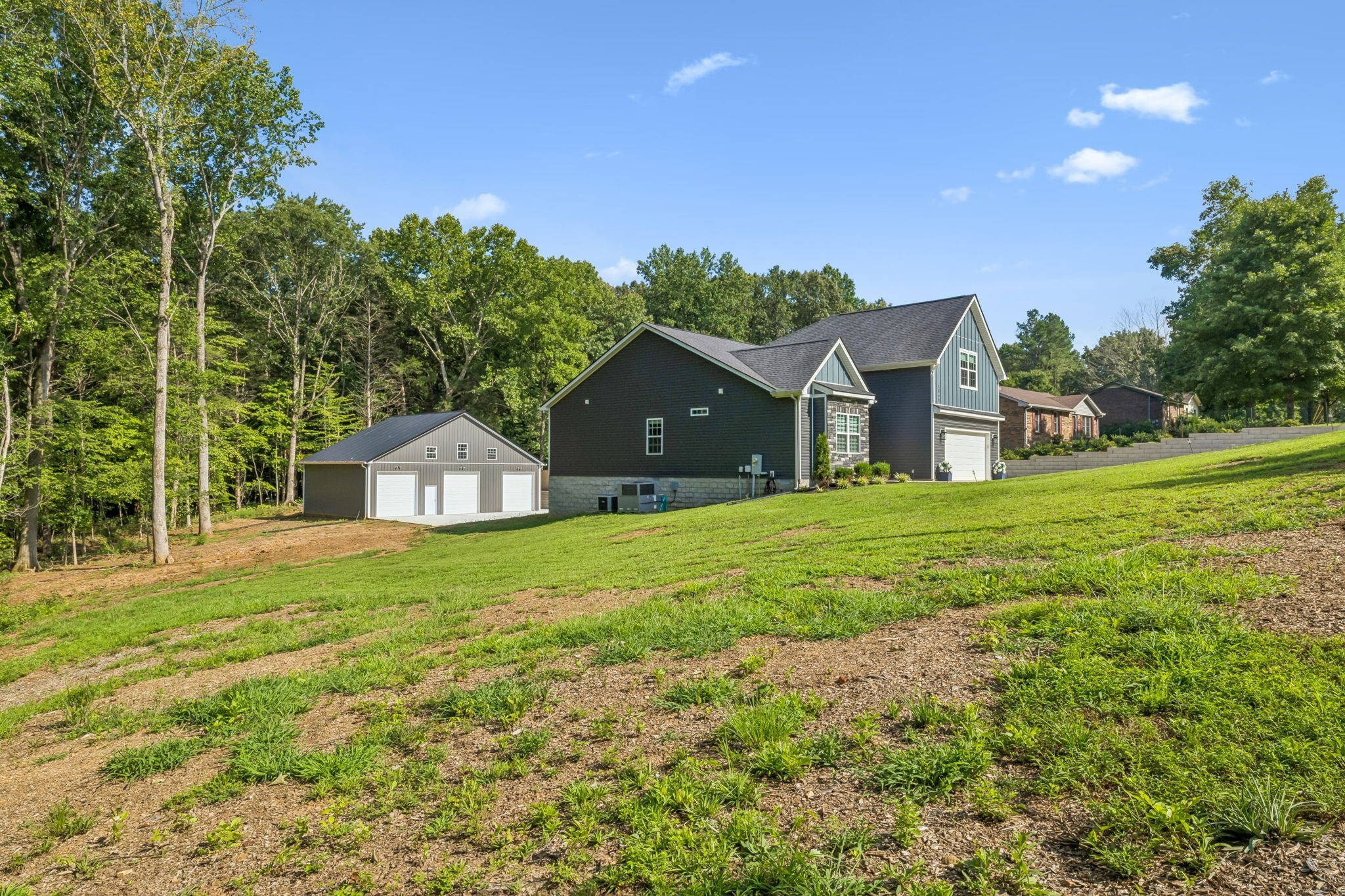 1845 Dinsmore Road Clarksville, TN 37040 - Photo 3 of 36 a front view of a house with yard and green space