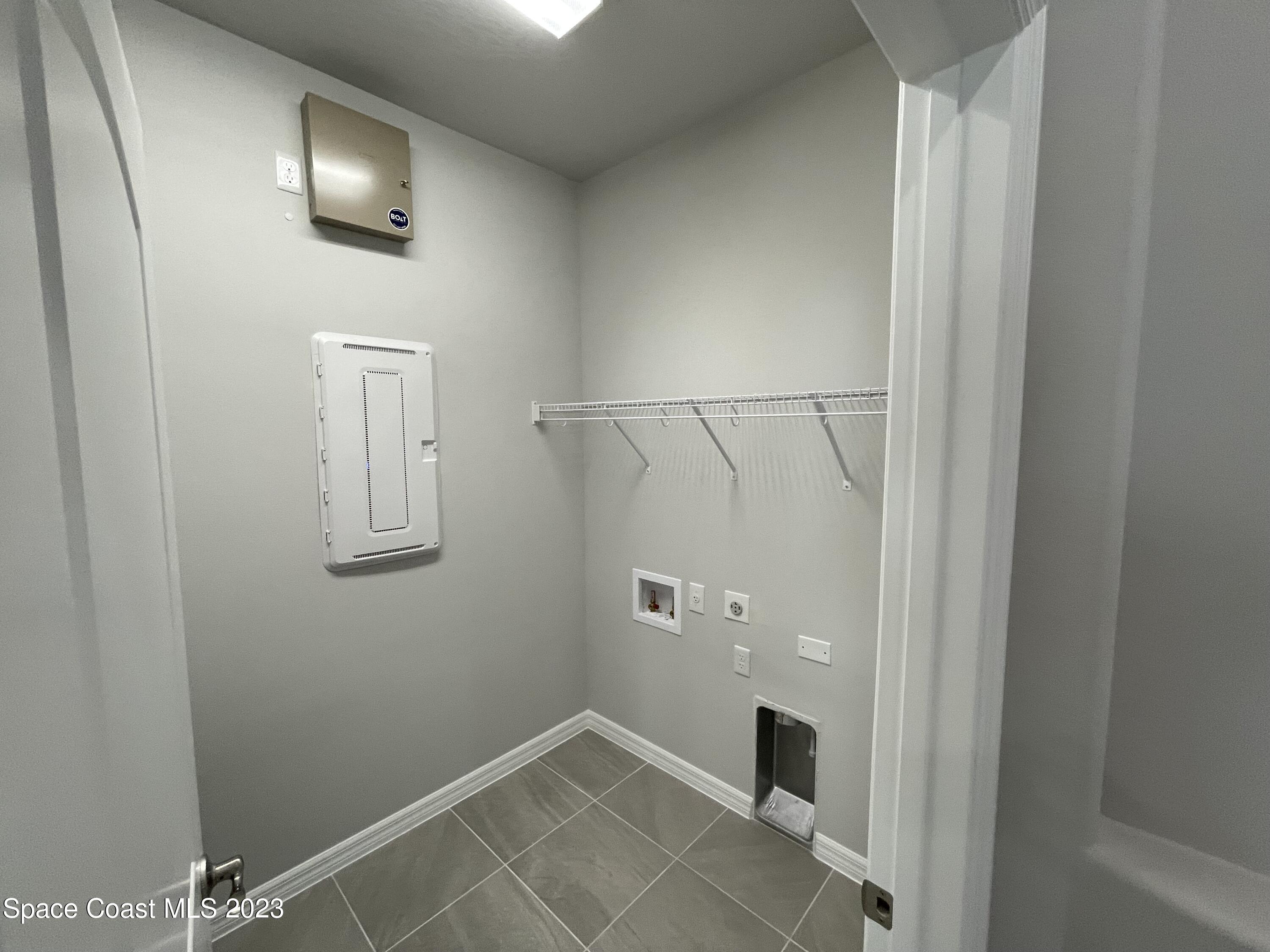 3085 Zeler Place Melbourne, FL 32940 - Photo 16 of 16 a view of a livingroom with wooden floor and white wall