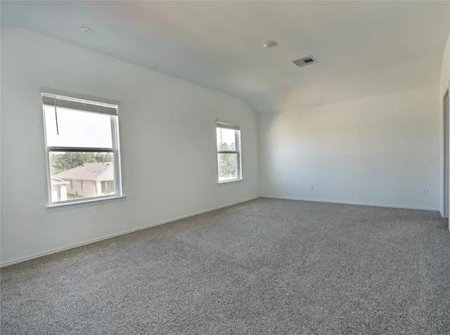 an empty room with windows
