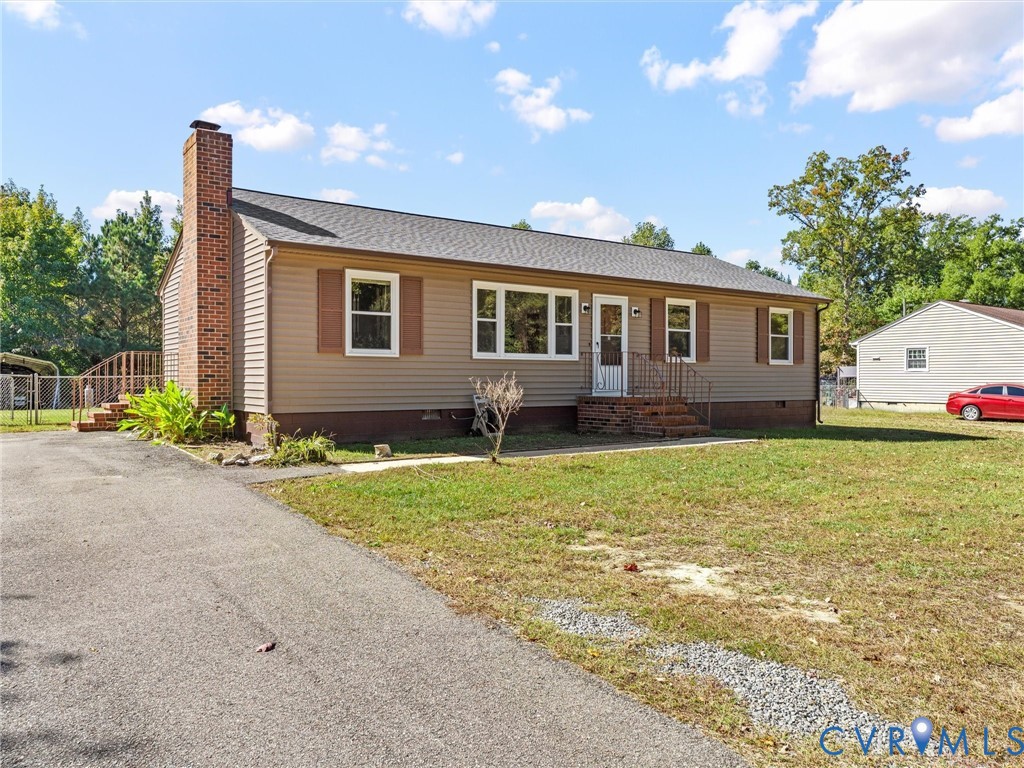 3913 Tavern Road Petersburg, VA 23805 - Photo 2 of 34 a house view with a garden space