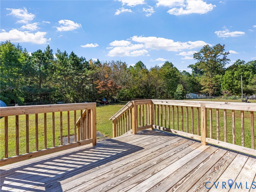 3913 Tavern Road Petersburg, VA 23805 - Photo 25 of 34 a view of balcony with wooden floor and fence