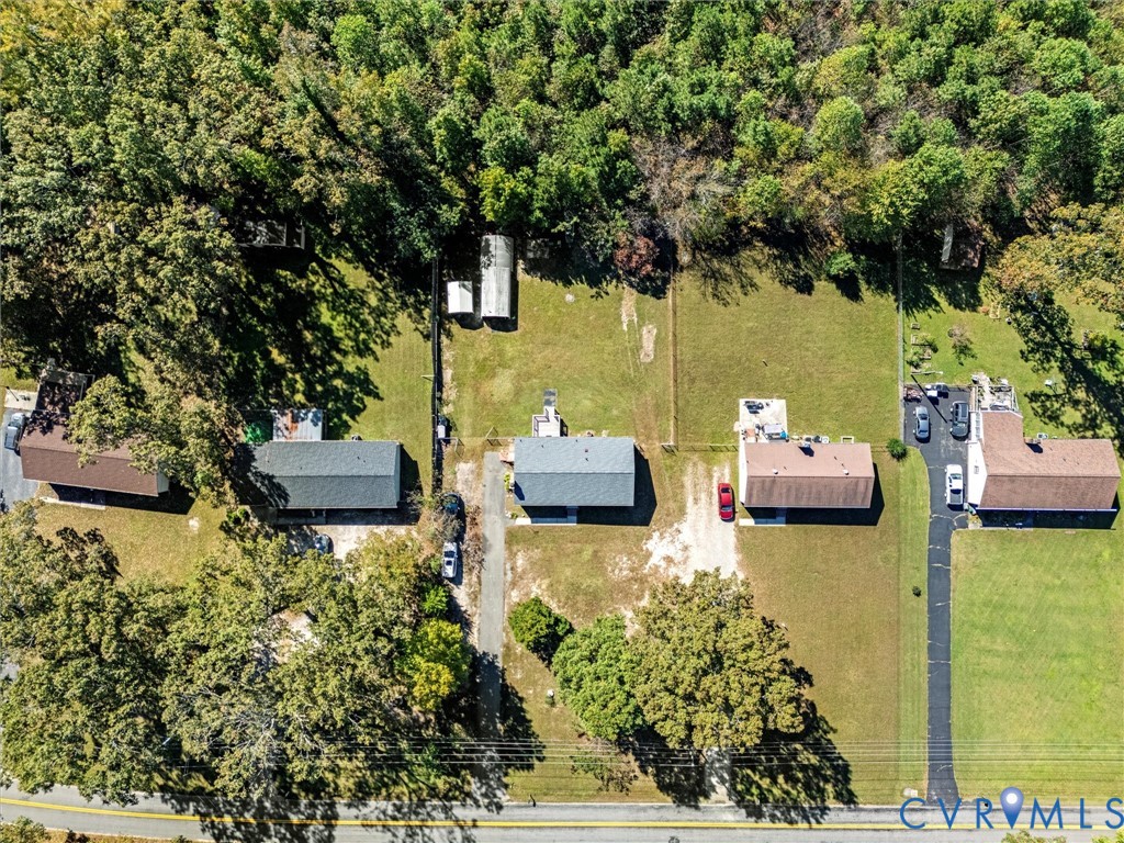 3913 Tavern Road Petersburg, VA 23805 - Photo 29 of 34 an aerial view of a house with swimming pool garden and lake view