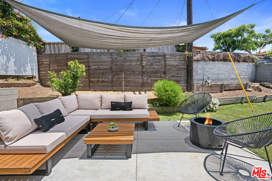 8000 Ramsgate Avenue Los Angeles, CA 90045 - Photo 12 of 23 a view of a patio with couches and potted plants