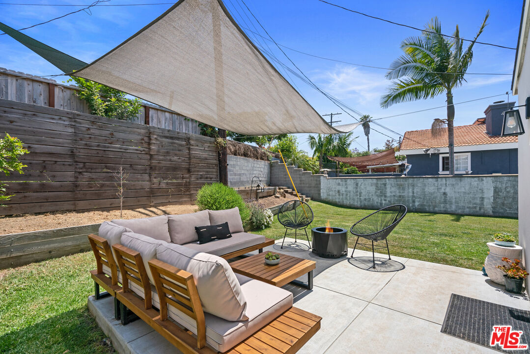 8000 Ramsgate Avenue Los Angeles, CA 90045 - Photo 13 of 23 a view of backyard with outdoor seating and plants