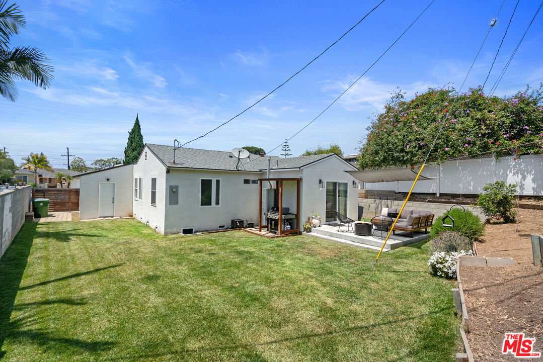 8000 Ramsgate Avenue Los Angeles, CA 90045 - Photo 15 of 23 a house view with a sitting space and garden