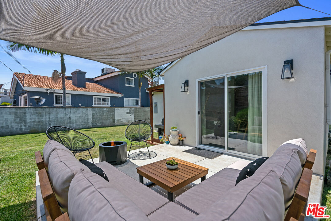 8000 Ramsgate Avenue Los Angeles, CA 90045 - Photo 19 of 23 a balcony with furniture and a potted plant