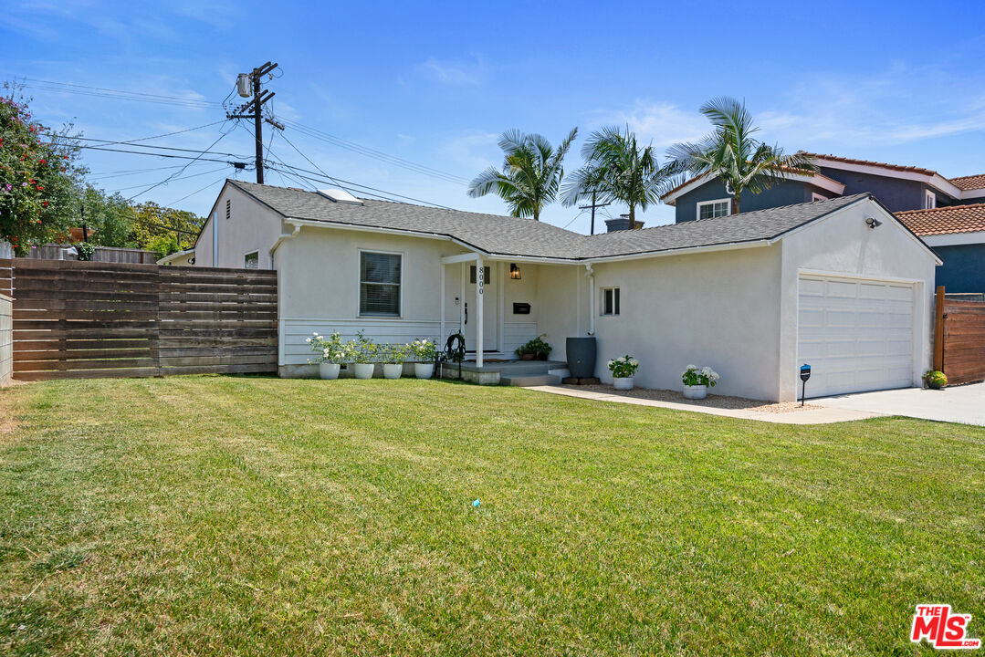 8000 Ramsgate Avenue Los Angeles, CA 90045 - Photo 20 of 23 a front view of a house with a yard