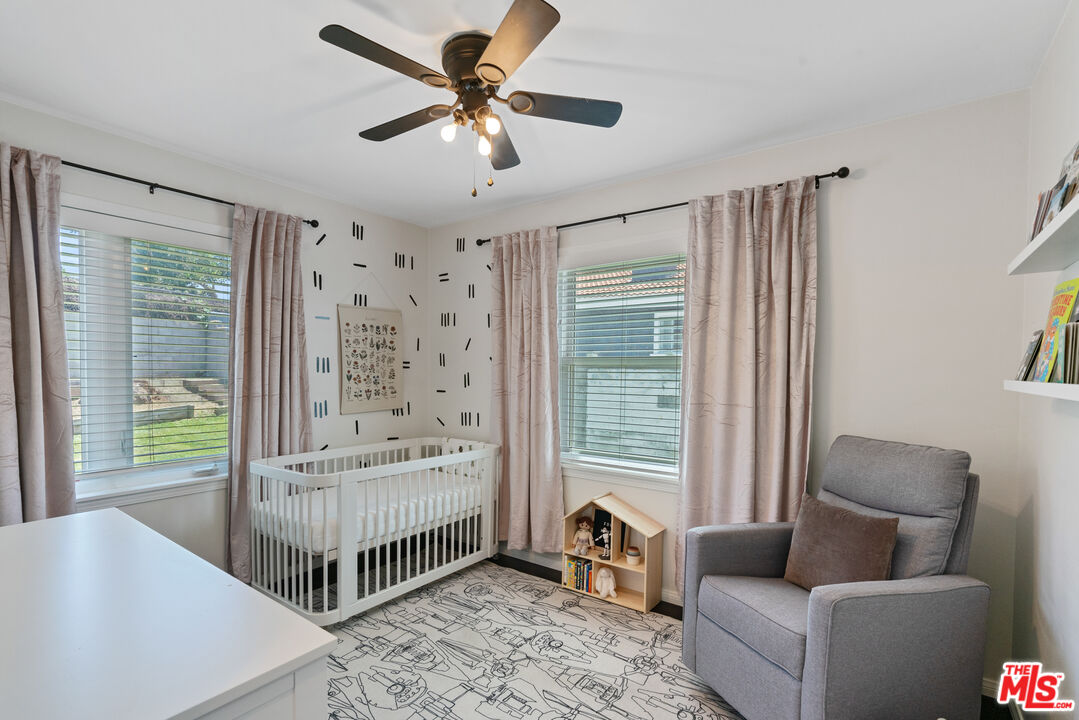 8000 Ramsgate Avenue Los Angeles, CA 90045 - Photo 9 of 23 a living room with furniture and a large window