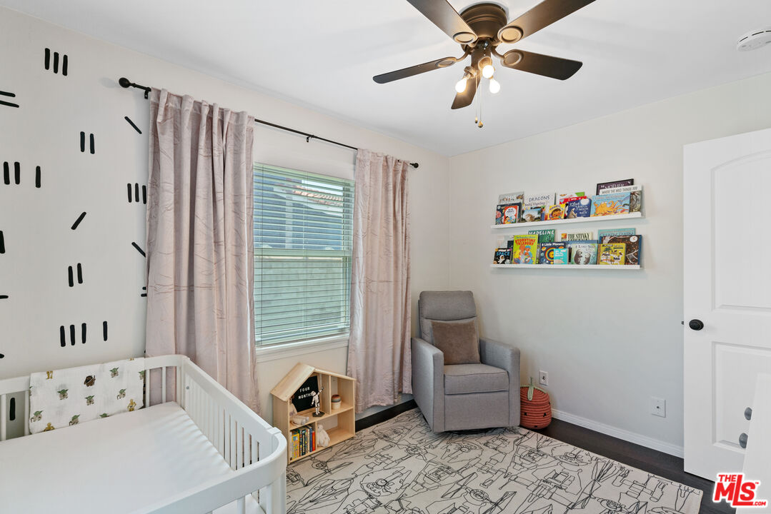 8000 Ramsgate Avenue Los Angeles, CA 90045 - Photo 10 of 23 a bedroom with furniture and a window