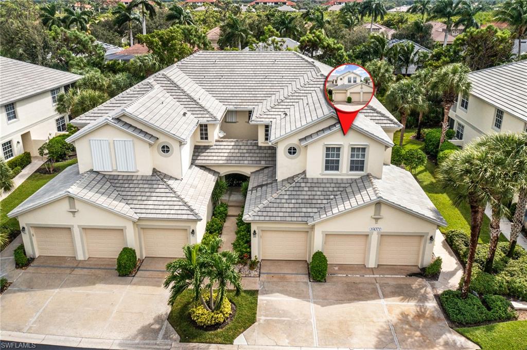 19071 Ridgepoint Drive, Unit 202 Estero, FL 33928 - Photo 20 of 26 a front view of a house with garden