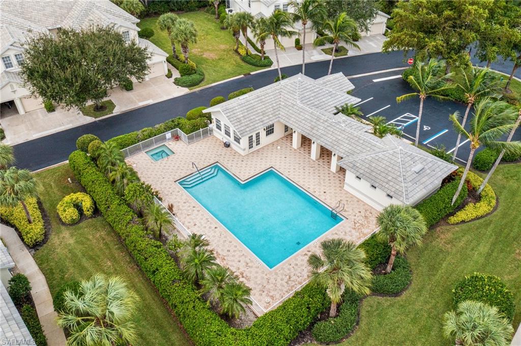 19071 Ridgepoint Drive, Unit 202 Estero, FL 33928 - Photo 23 of 26 an aerial view of a house with yard
