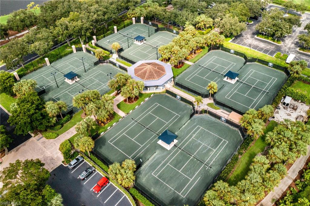 19071 Ridgepoint Drive, Unit 202 Estero, FL 33928 - Photo 25 of 26 an aerial view of a house with a yard basket ball court and outdoor seating