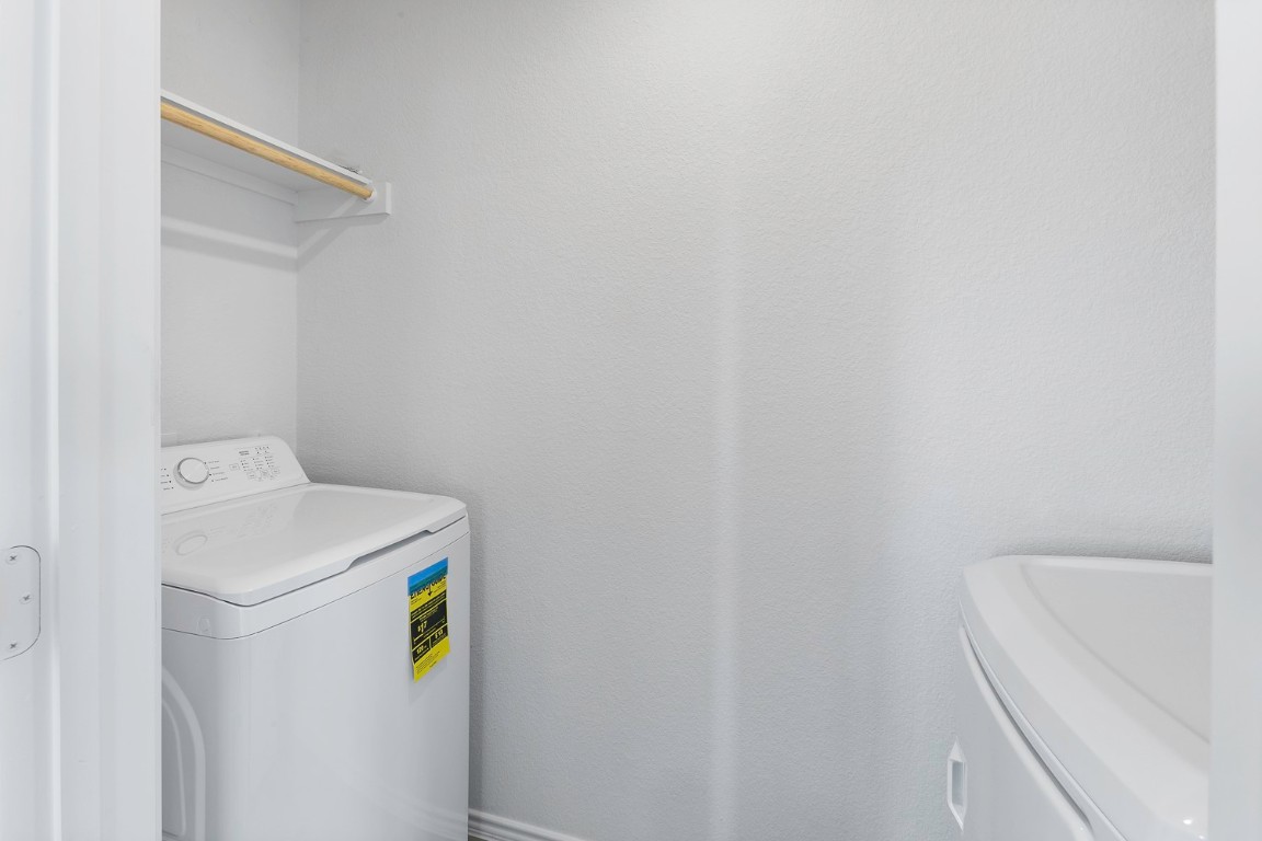 331 Bugbee Kyle, TX 78640 - Photo 15 of 22 a utility room with dryer and washer