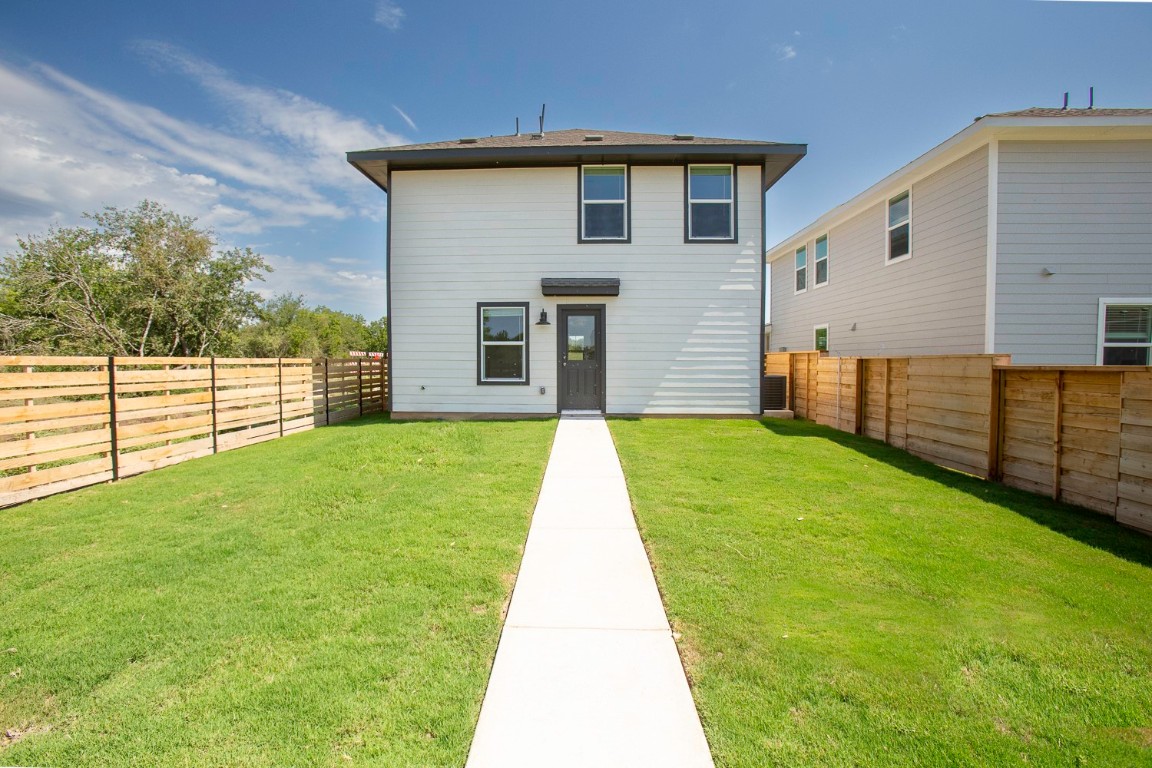 331 Bugbee Kyle, TX 78640 - Photo 17 of 22 a view of a backyard with wooden fence