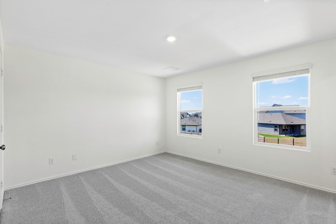 331 Bugbee Kyle, TX 78640 - Photo 8 of 22 an empty room with a window