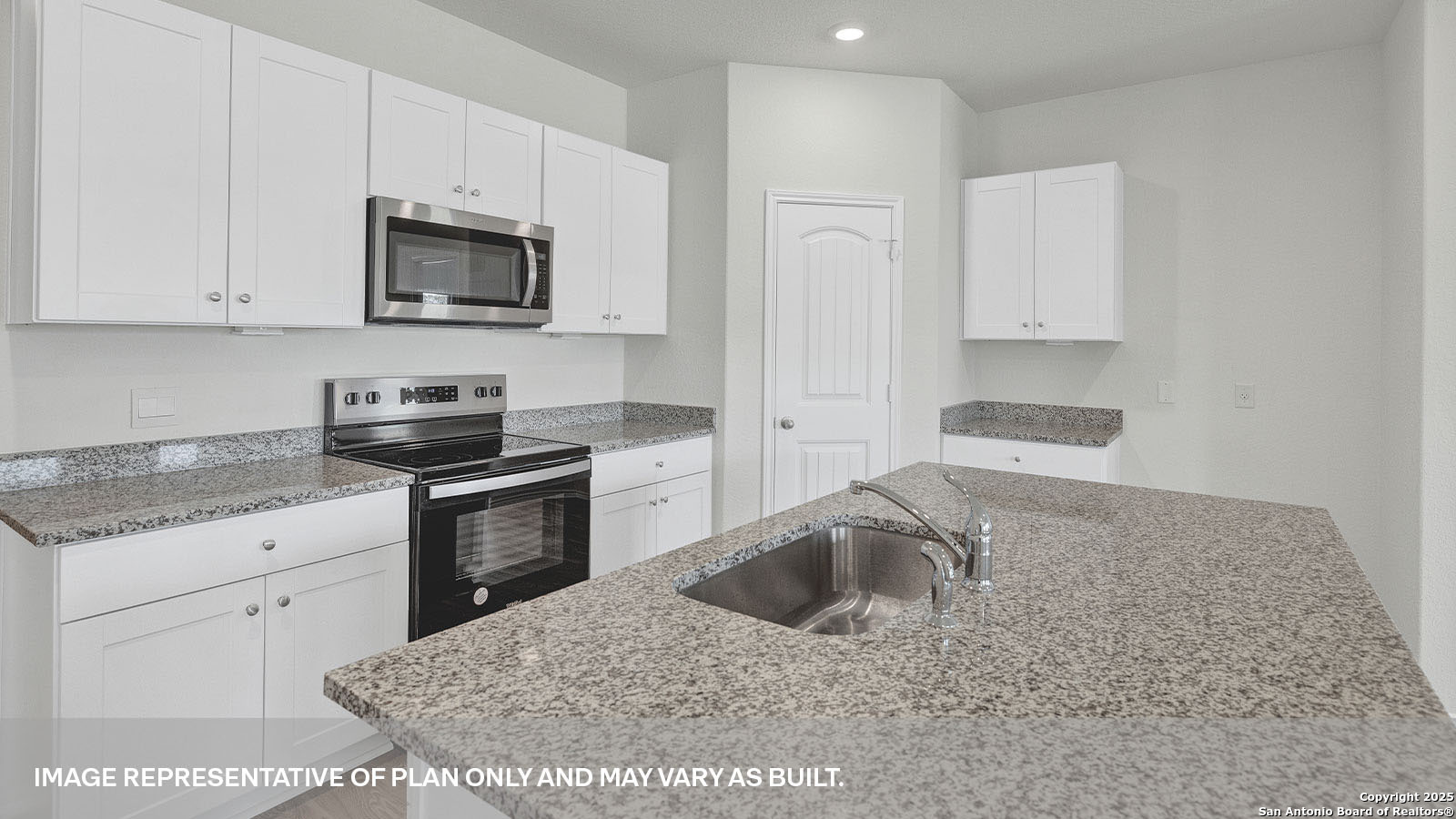 335 Boatman Cove Seguin, TX 78155 - Photo 11 of 38 a kitchen with stainless steel appliances granite countertop a sink stove and microwave