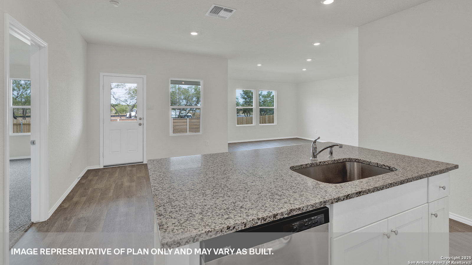 335 Boatman Cove Seguin, TX 78155 - Photo 14 of 38 a kitchen with a sink and granite