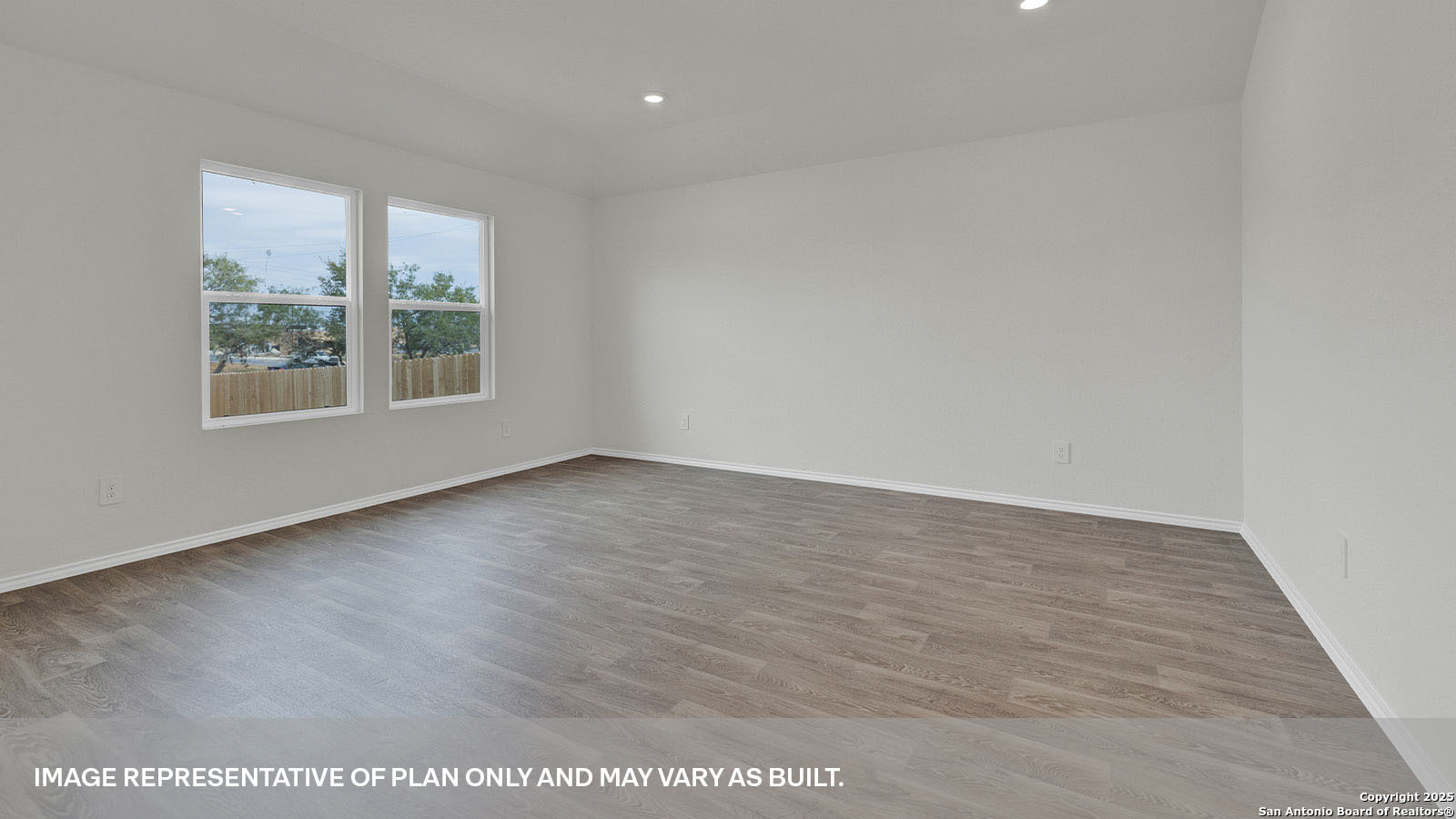 335 Boatman Cove Seguin, TX 78155 - Photo 16 of 38 an empty room with wooden floor and windows