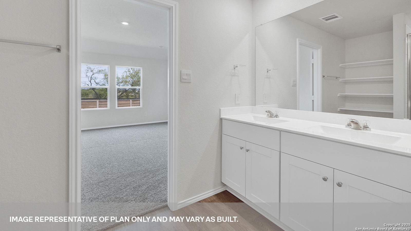 335 Boatman Cove Seguin, TX 78155 - Photo 22 of 38 a bathroom with a sink and a mirror