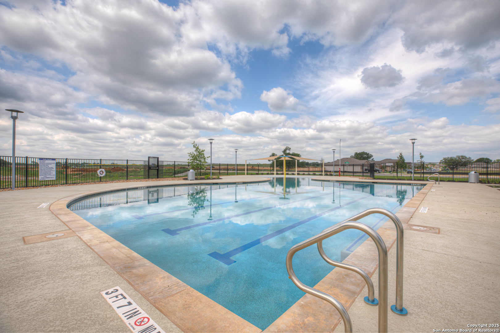 335 Boatman Cove Seguin, TX 78155 - Photo 35 of 38 a view of a swimming pool with a terrace