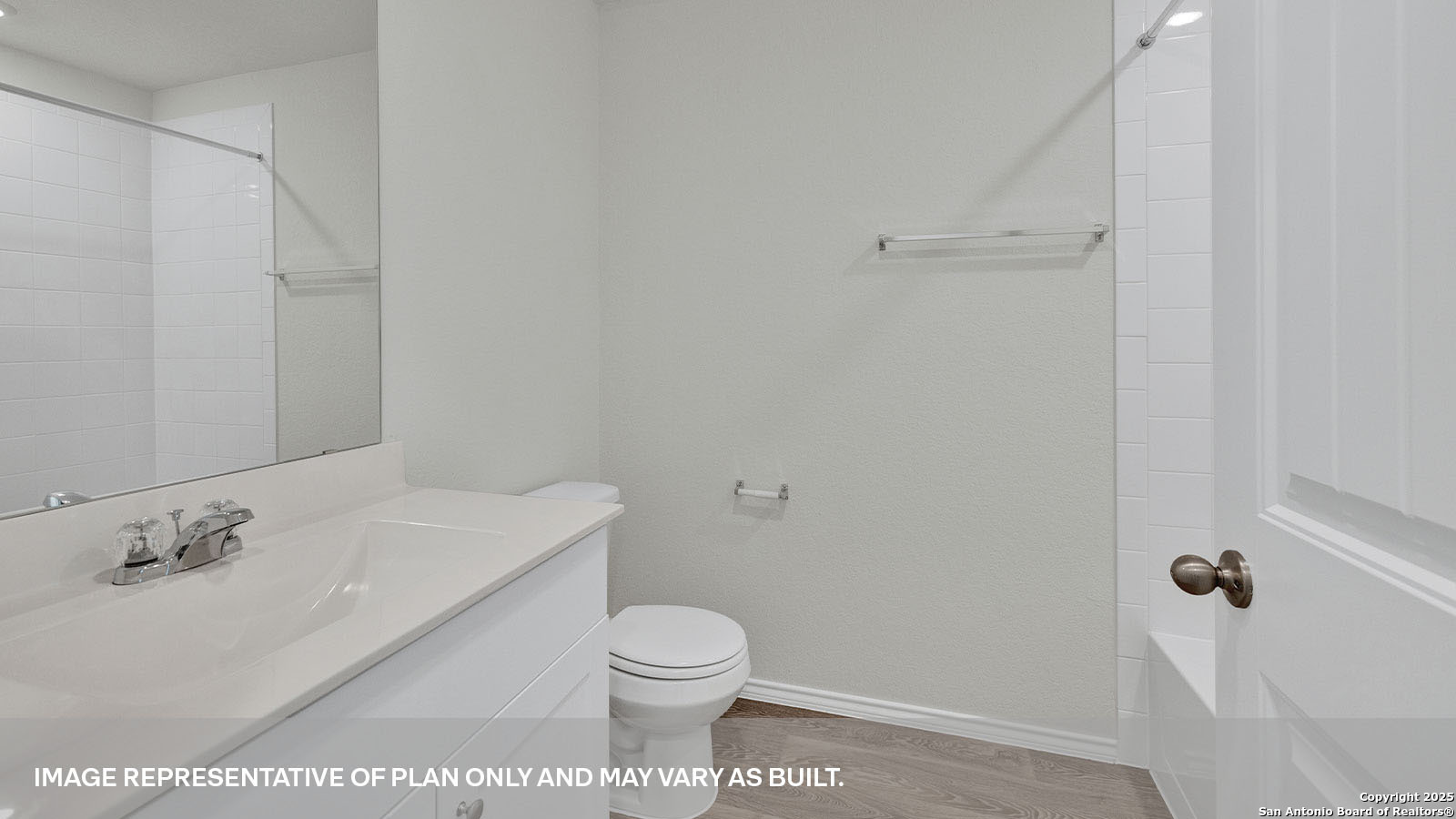 335 Boatman Cove Seguin, TX 78155 - Photo 5 of 38 a bathroom with a sink toilet and vanity