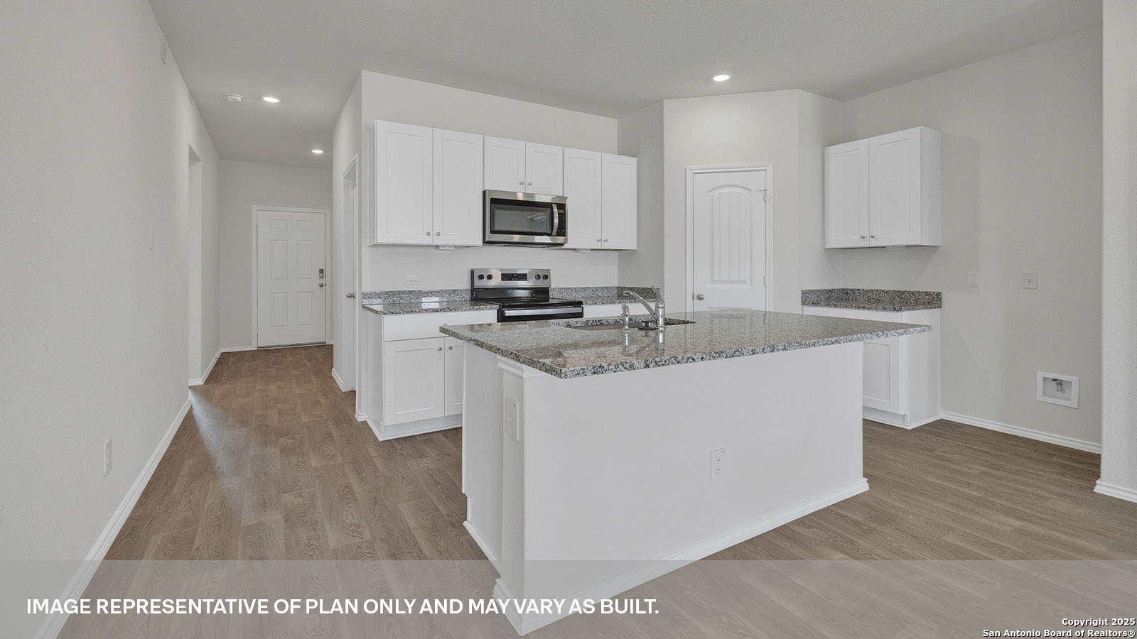335 Boatman Cove Seguin, TX 78155 - Photo 9 of 38 a kitchen with stainless steel appliances granite countertop a stove a sink and a microwave