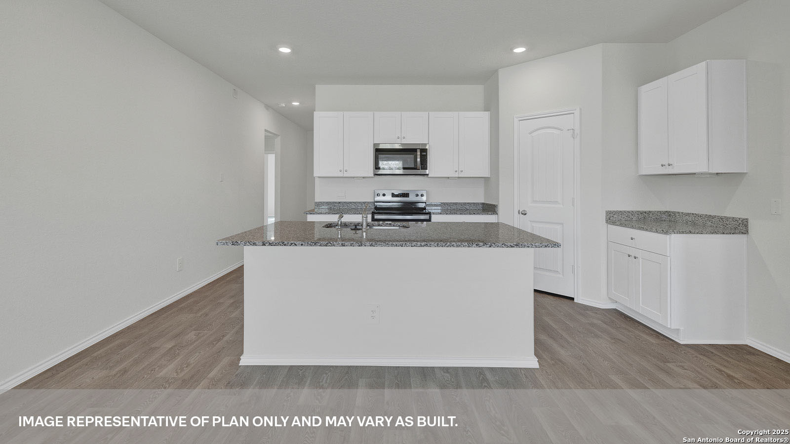 335 Boatman Cove Seguin, TX 78155 - Photo 10 of 38 a kitchen with stainless steel appliances a sink stove and cabinets