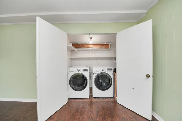 a utility room with dryer and washer