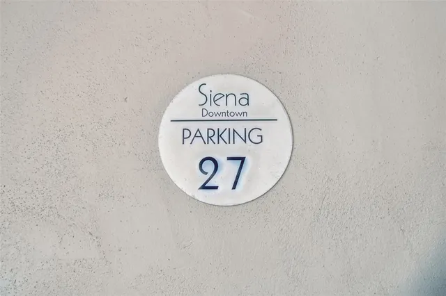 a view of a livingroom with car parked