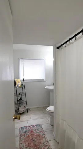 a bathroom with a toilet