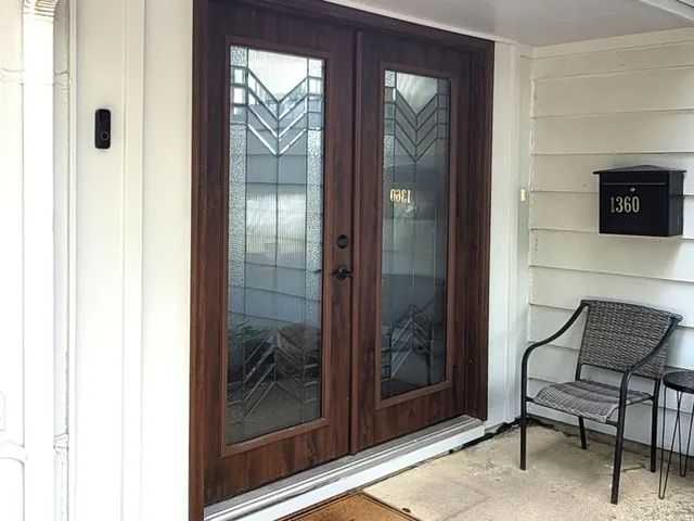 a view of a elevator and mirror