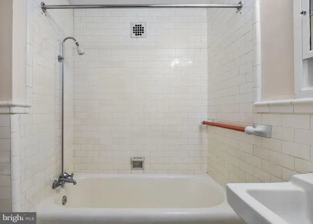 a bathroom with a bathtub